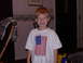 1992 Ford F-150 - A young child smiles while wearing a white t-shirt with the American flag and the word USA printed on it.