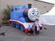 1992 Ford F-150 - Family poses in front of a large inflatable Thomas the Tank Engine at an outdoor event.