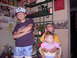 1992 Ford F-150 - Three children pose for a photo indoors, with a kitchen shelf and refrigerator in the background.