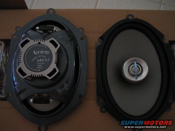 Two car speakers, one labeled Infinity Kappa series 682.7cf
