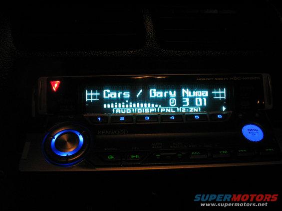 Kenwood car stereo display showing "Cars / Gary Numa 0 3 01"