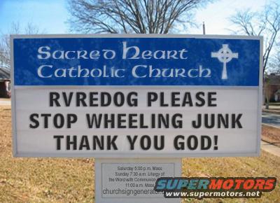 Sacred Heart Catholic Church sign with message 'RVREDOG PLEASE STOP WHEELING JUNK THANK YOU GOD!'