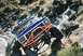 1979 Ford Bronco - This modified 1979 Ford Bronco navigates a rocky trail with its custom roll cage and large tires.