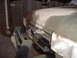 1988 Ford Bronco - The front end of a vehicle, likely a truck or SUV, is shown with its grille and hood prepped for paint. The registry claims it is a 1988 Fo…