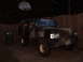 1988 Ford Bronco - 1988 Ford Bronco with camouflage paint is parked outside at dusk.