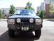 1996 Jeep Grand Cherokee - Front view of a 1996 Jeep Grand Cherokee equipped with an aftermarket bull bar and winch.