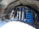1985 Ford Ranger - This image shows the upgraded suspension system, dual Fox Racing Shox and bright blue coil springs.