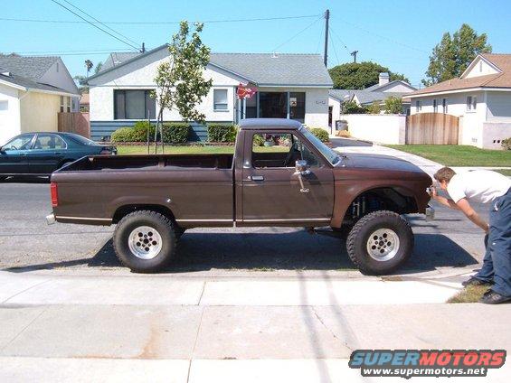 Brown 1985 Ford Ranger pickup truck, lifted with off-road tires
