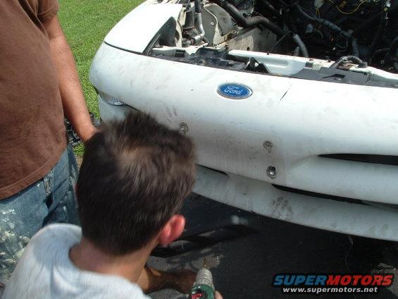 White 1996 Ford Probe front bumper with Ford logo
