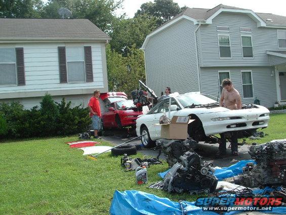 White 1996 Ford Probe with engine removed, front view