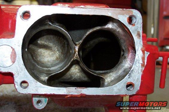 Close-up of a red intake manifold with two large openings