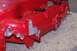 1997 Ford Probe - A red engine intake manifold is shown up close, with visible mounting points and small tubes.
