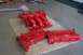 1997 Ford Probe - Red Ford intake manifold and valve covers are shown on a rug, with tools and a broom visible in the background.