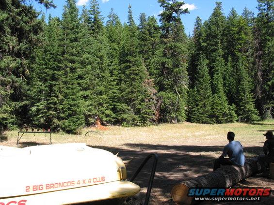 Huntercamp, clearing about football field size, mostly covered in green grass.