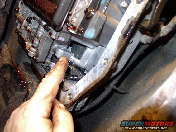 img_0043.jpg Not only was I copying the Ford Racing pan's bolt location, but where my finger is pointing is the only fairly deep "well" area that the drain bolt won't interfere with anything.