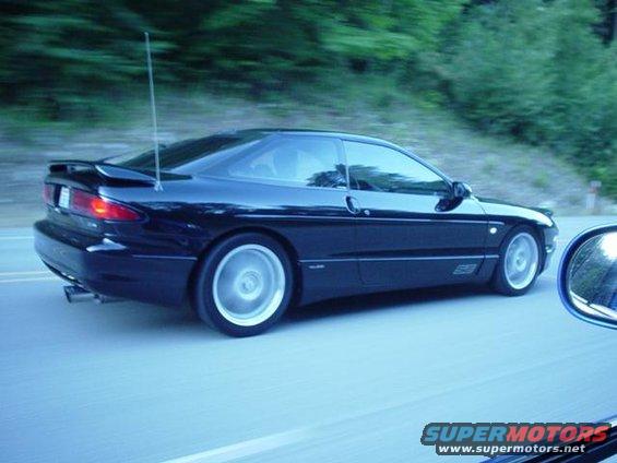 Black 1994 Ford Probe side view