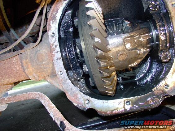Despite the fluid being dirty, it had zero metal content in it and there was no visible wear on any gear teeth. A quick count verified a 3.27 ratio. Nobody uses gaskets anymore, just clean the cover mating surface and silicone it back on, using the many bolts you took off.