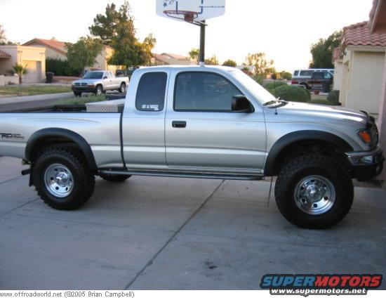 Picture of the truck right after the lift, tires, and new rims installed.