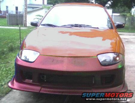 Front view of a car with custom body kit and two-tone paint job