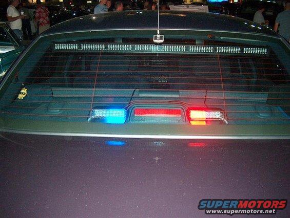 2001 Ford Crown Victoria rear with light bar and police lights