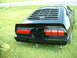 1978 Ford Mustang II - This black coupe features distinctive horizontal louvers over the rear window and triple stacked taillights.