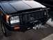 1996 Jeep Grand Cherokee - This black 1996 Jeep Grand Cherokee features a custom bull bar and winch for off-road use.