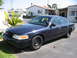 2000 Ford Crown Victoria - After driving it home from St Louis... Damn TX potholes ate two of my hubcaps.