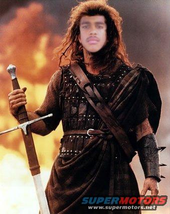 Man in medieval armor and kilt holding a sword, with a fiery background. Text 'SUPERMOTORS' visible