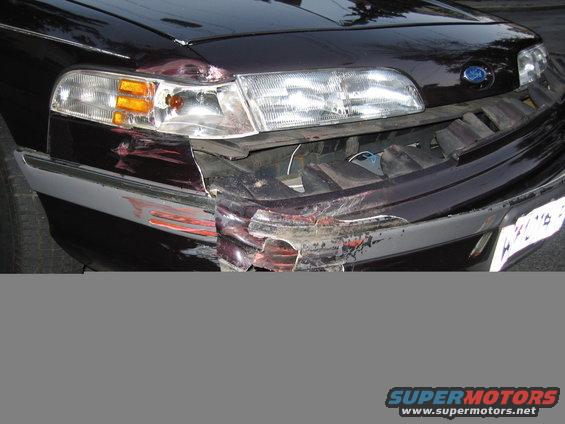 Front bumper and headlight damaged on a 1992 Ford Crown Victoria