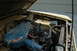 1972 Ford Bronco - Engine bay of a 1972 Ford Bronco, showing the V8 engine and radiator. Handwritten markings are visible on the radiator.