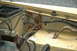 1972 Ford Bronco - Wiring and rust are visible in the engine bay of this vehicle.