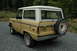 1972 Ford Bronco - This 1972 Ford Bronco is viewed from a three-quarter rear angle, showing its distinctive body style and spare tire.
