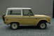 1972 Ford Bronco - This 1972 Ford Bronco is seen from the side, a two-tone yellow and white color scheme and a spare tire mounted on the rear.