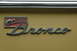 1972 Ford Bronco - Close-up of a chrome Bronco Sport emblem with a horse graphic.