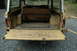 1972 Ford Bronco - Rear view of a 1972 Ford Bronco, showing the cargo space and folded rear seat.