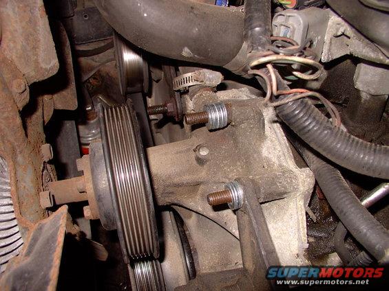 I just added washers onto the water pump studs, behind the bracket, to space it out far enough for the bracket to fit the large case 3G alternator.