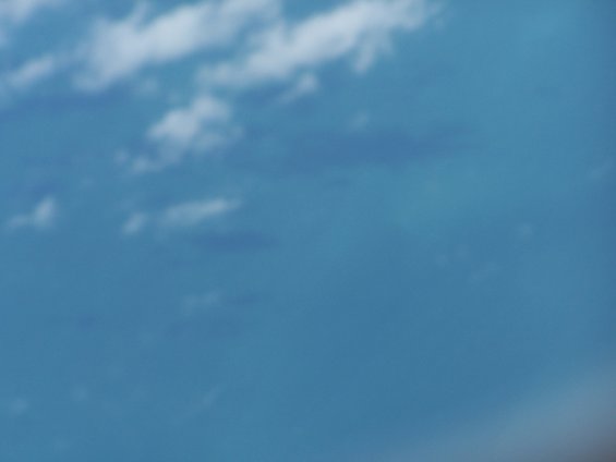 Blue sky with scattered white clouds
