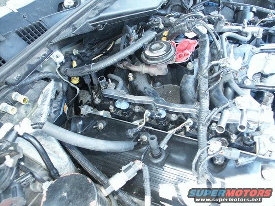 pict0010.jpg You know guys, I don't think that engine will run very well with that red rag in there..... but that's just me.