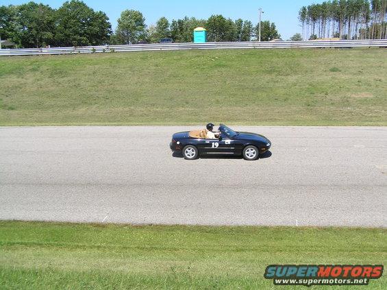 p9050004.jpg black miata on straight