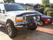 2001 Ford Excursion - New Milemarker 12k and light bar. Lots of steel upfront. :-)