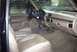 1993 Ford Bronco - Interior view of a 1993 Ford Bronco, tan leather seats and dashboard.