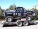 1979 Ford Bronco - This modified 1979 Ford Bronco is equipped for off-road racing with numerous sponsor decals and a roll cage.
