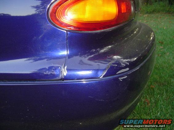 drivers side rear bumper... worst mark on the car... bought it this way... its honestly not too noticable.. im assuming a small fender bender or something of that nature