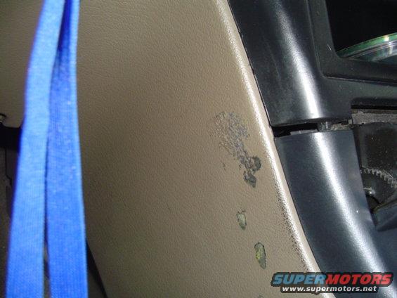 drivers side interior panel... adhesive from previous owner... couldnt get it off... im sure wih some specific adhesive remover it would come right off...