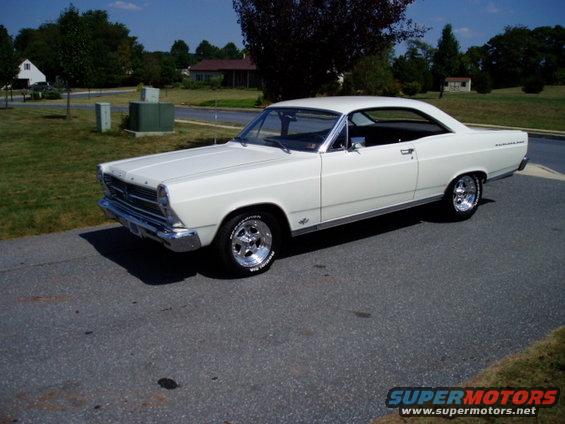 White 1966 Ford Fairlane coupe parked on a street