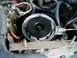 2002 Ford F-250 - Engine bay detail showing a fuel filter housing and associated plumbing and wiring.