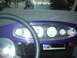 1978 Ford Bronco - Interior view of a custom dashboard with multiple gauges and a steering wheel.