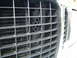 2000 Ford Excursion - panel behind grill drilled to allow clean cold air to intake
