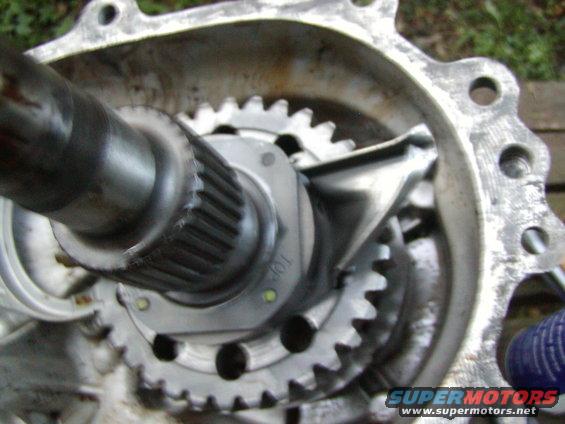 tcase-009.jpg another damage angle...thing i dont get is how did this hit the side of the casing???