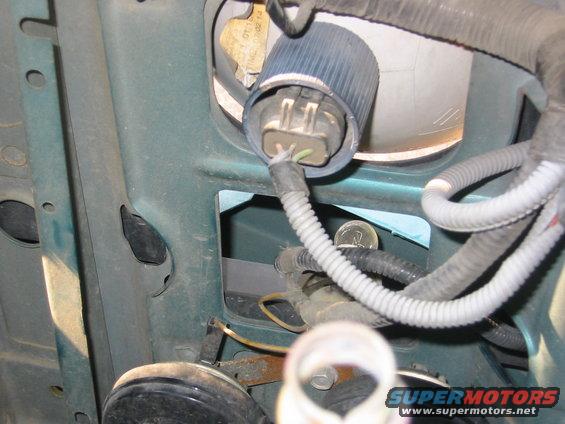 then the turnsignal, trim and side light slide out, remember to disconnect the lights